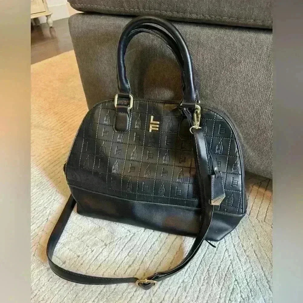 Beautiful London Fog vegan leather zip around purse.